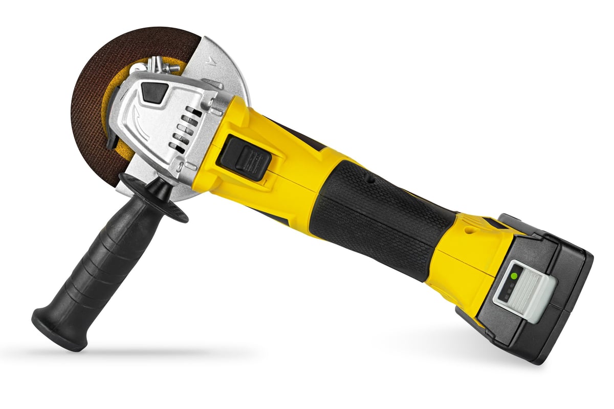 yellow cordless battery pack powered angle grinder electric hand diy construction tool machine isolated on white background