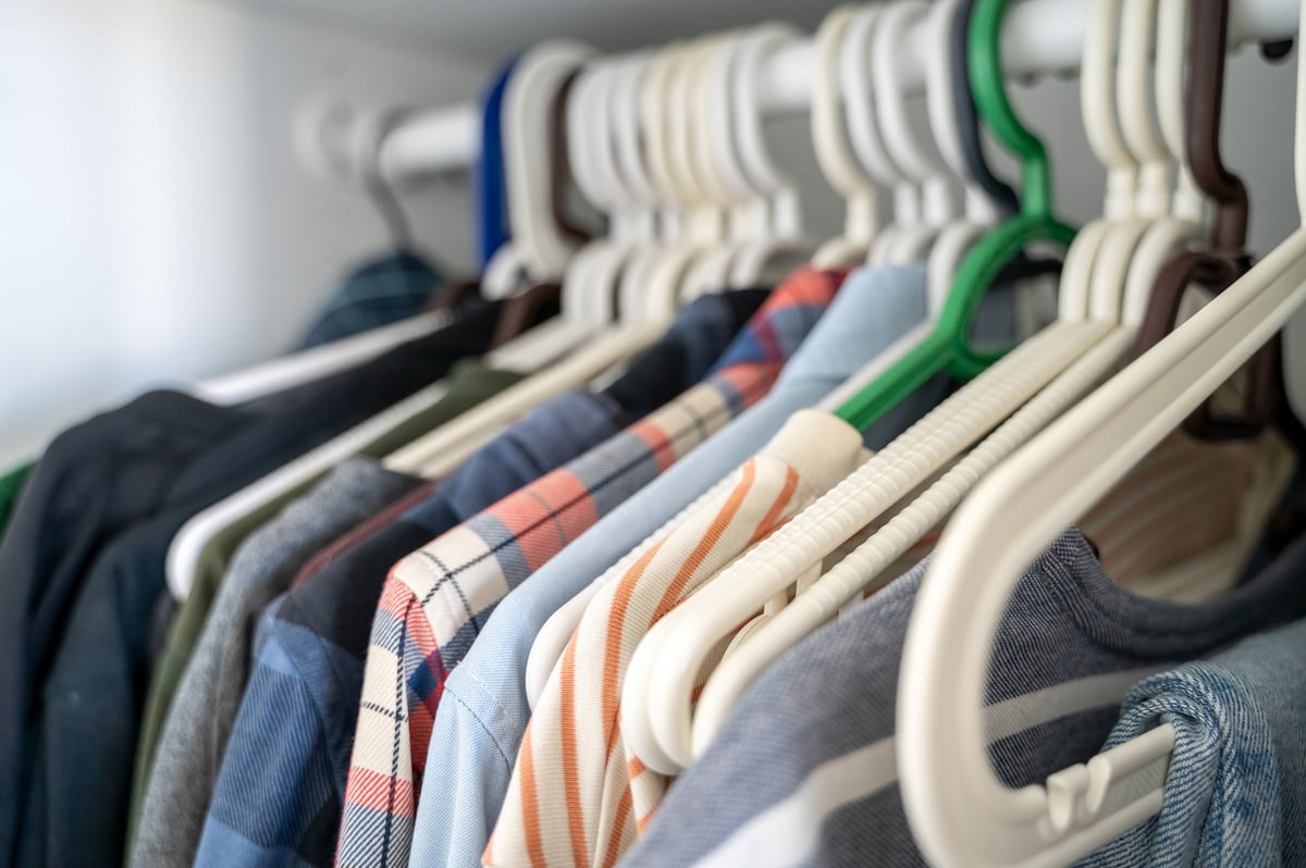 Wardrobe with various hangers and clothing