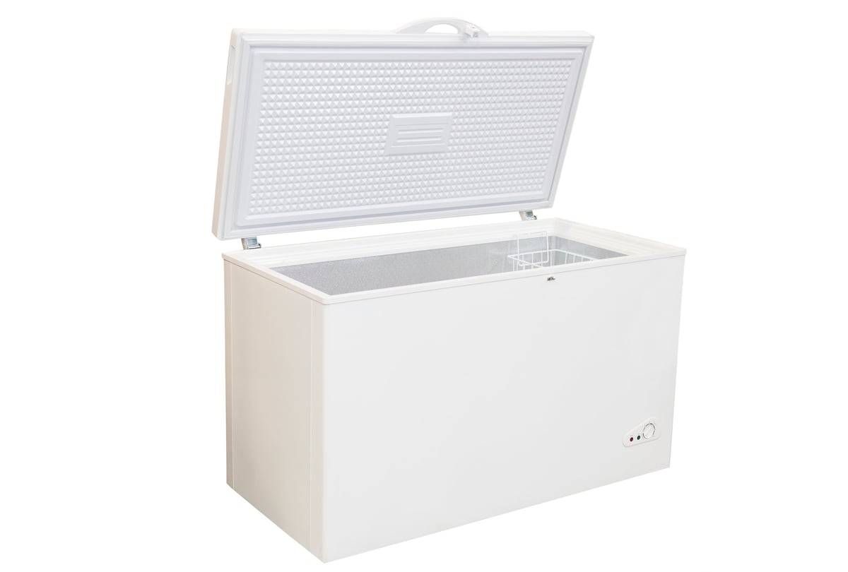 Open chest freezer isolated